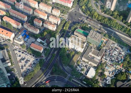View from the 632 metre high Shanghai Tower, nicknamed The Twist, Shanghai, People's Republic of China, Complex intersection with flowing traffic Stock Photo