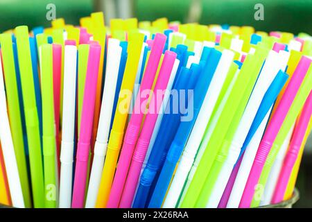 many multi-color tubules for a cocktail, Background of colorful tubules.  Drink straws, tubules. Stock Photo