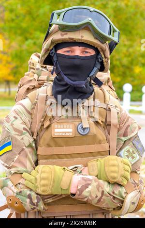 Special Forces soldier. Military man in camouflage and helmet with a backpack. Ukrainian military. Vinnitsa. Ukraine. 10.12.2019. Stock Photo