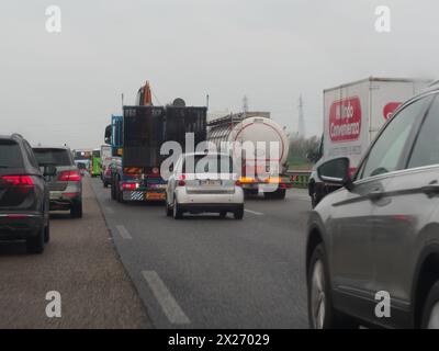 Milan, Italy - April 26th 2023 traffic jam Approaching a toll booth with a navigation device in the foreground, A1 highway Stock Photo