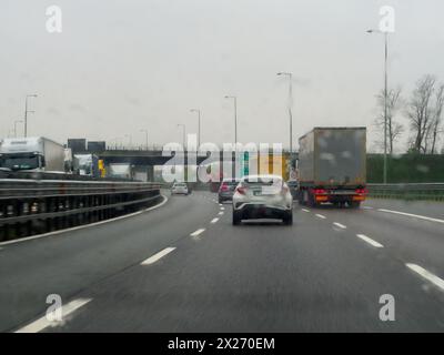 Milan, Italy - April 26th 2023 Circulating on a highway under cloudy conditions, A1 A8 highway near Milan, Italy Stock Photo