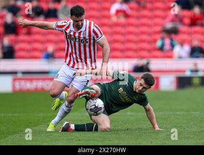 Adam Randell of Plymouth Argyle shields the ball  during the Sky Bet Championship match Stoke City vs Plymouth Argyle at Bet365 Stadium, Stoke-on-Trent, United Kingdom, 20th April 2024  (Photo by Stan Kasala/News Images) in ,  on 4/20/2024. (Photo by Stan Kasala/News Images/Sipa USA) Stock Photo