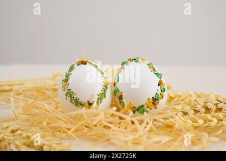 Colourful Easter eggs with different patterns aligned on background Stock Photo
