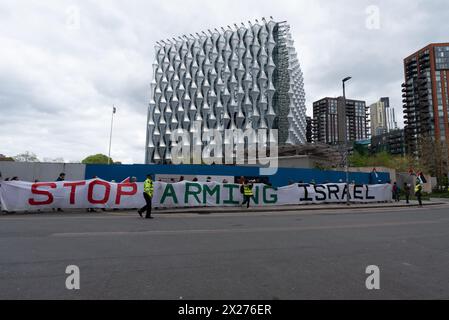 London, UK. 20 April, 2024. A giant banner declaring 'Stop Arming Israel' is displayed by Palestine supporters gathered outside the U.S. Embassy as part of a proposed 24/7 picket demanding the United States stop supporting Israel's war on Gaza and calling for an immediate ceasefire. The U.S. is Israel's largest provider of weapons and financial support and last week was the sole member to veto a UN Security Council resolution that may have furthered Palestine's goal of recognized statehood. Credit: Ron Fassbender/Alamy Live News Stock Photo