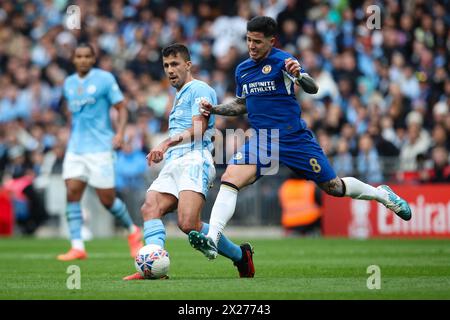 LONDON, UK - 20th Apr 2024:  Rodrigo of Manchester City under pressure from Enzo Fernandez of Chelsea during the Emirates FA Cup Semi-Final match between Manchester City FC and Chelsea FC at Wembley Stadium  (Credit: Craig Mercer/ Alamy Live News) Stock Photo