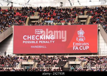 The big screen showing a VAR check for a foul on Arsenal goalkeeper ...