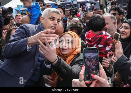 London, UK. 20th Apr, 2024. The mayor with members of the public. Sadiq Khan, Mayor of London who is standing for re-election on May 2, speaks at the Eid in the Square Festival and then interacts with the crowds for chats and selfies, before watching some of the stage performances. The Mayor of London's free, annual festival returns to Trafalgar Square for the 19th year to celebrate the end of Ramadan, the holy month of fasting. Credit: Imageplotter/Alamy Live News Stock Photo