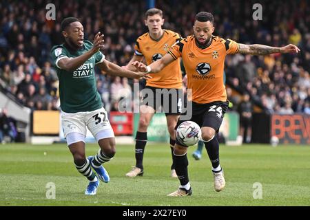 Jordan Cousins (24 Cambridge United) challenged by Ebou Adams (32 Derby) during the Sky Bet League 1 match between Cambridge United and Derby County at the Cledara Abbey Stadium, Cambridge on Saturday 20th April 2024. (Photo: Kevin Hodgson | MI News) Credit: MI News & Sport /Alamy Live News Stock Photo