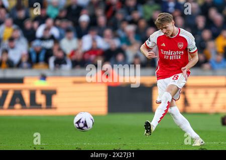 Wolverhampton, UK. 20th Apr, 2024. Martin Odegaard passes to the centre during the Premier League match between Wolverhampton Wanderers and Arsenal at Molineux, Wolverhampton, England on 20 April 2024. Photo by Stuart Leggett. Editorial use only, license required for commercial use. No use in betting, games or a single club/league/player publications. Credit: UK Sports Pics Ltd/Alamy Live News Stock Photo
