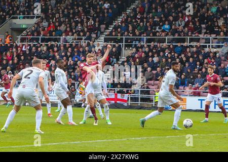 Northampton 20 April 2022:Northampton Town's Jon Guthrie shoots and scores Northampton's equalising goal in the EFL Division 1 Northampton Town v Exeter City Credit: Clive Stapleton/Alamy Live News Stock Photo