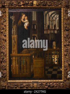 Jan Provost (1465-1529). Flemish painter. Madonna and Child on a pedestal within the nave of a Gothic church. Oil on panel. Ala Ponzone Civic Museum. Cremona. Italy. Stock Photo