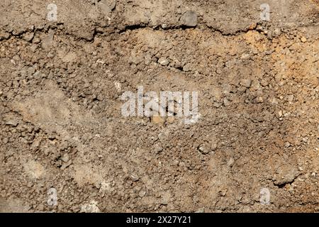 Concrete wall background in holes in gray with space for notes. For design. High quality photo Stock Photo