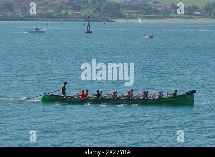 A traditional Cantabrian trainera racing rowing boat training in the bay of Santander Cantabria Spain Europe Stock Photo