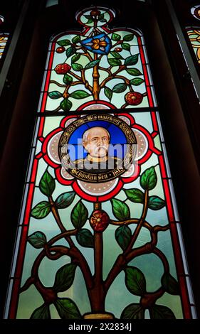 Stained glass portrait of Otto von Bismarck in the interior of Drachenfels castle Stock Photo