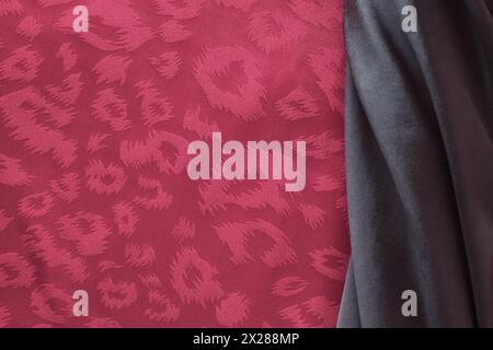 Smooth elegant red and black satin texture can use as abstract background. Luxurious background design Stock Photo