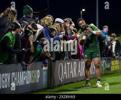 Galway, Ireland. 20th April, 2024. Connacht's Bundee Aki taking selfies with fans after the match Credit: Don Soules/Alamy Live News Stock Photo