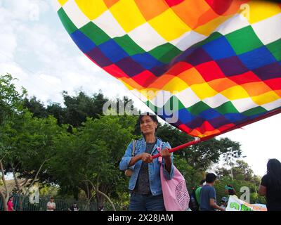 Lima, Peru. 20th Apr, 2024. Protesters waving a Wiphala, the flag of indigenous peoples, when dozens of demonstrators and environmentalists took to the streets, demonstrating for the recent modifications to the forestry law that would facilitate the deforestation of the Amazon and illegal logging Credit: Fotoholica Press Agency/Alamy Live News Stock Photo