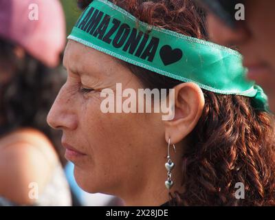 Lima, Peru. 20th Apr, 2024. 'Amazonia' can be read on the headband of an indigenous woman when dozens of demonstrators and environmentalists took to the streets, demonstrating for the recent modifications to the forestry law that would facilitate the deforestation of the Amazon and illegal logging Credit: Fotoholica Press Agency/Alamy Live News Stock Photo