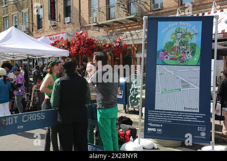 New York, USA. 20th Apr, 2024. People stop at a section of car-free open street in Queens, New York City, the United States, on April 20, 2024. New Yorkers celebrate Earth Day on Saturday with biking, music and dance performances, educational programs, sports activities, arts, crafts and other activities in multiple car-free open streets. Credit: Liu Yanan/Xinhua/Alamy Live News Stock Photo