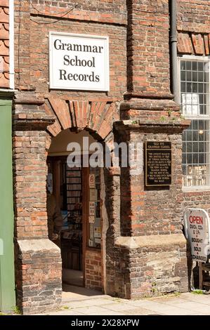 RYE, EAST SUSSEX, UK - APRIL 30, 2012:   Entrance to Grammar School Records shop housed in the former  Thomas Peacocke grammar school building Stock Photo
