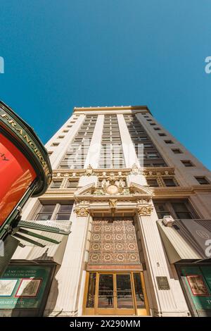 San Francisco, California, April 8, 2024. Looking up at the ornate facade of the Hearst Building in San Francisco against a clear sky. Stock Photo