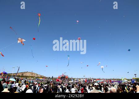 Weifang, China. 21st Apr, 2024. Tourists are visiting the Weifang International Kite Fair in Weifang, Shandong Province, China, on April 20, 2024. (Photo by Costfoto/NurPhoto) Credit: NurPhoto SRL/Alamy Live News Stock Photo