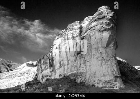 Black and white view of the Dramatic, imposing Sandstone cliff known as the Brandwag Buttress in the Golden Gate Highlands National Park, South Africa Stock Photo