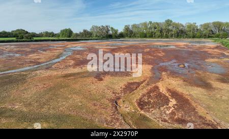 Waste dump toxic aerial drone factory sugarcane manufacturing mill sugar beet water former lagoon, plant effects nature from soil contaminated Stock Photo