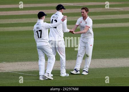 George Balderson of Lancashire celebrates with his team mates after taking the wicket of Noah Thain during Essex CCC vs Lancashire CCC, Vitality Count Stock Photo