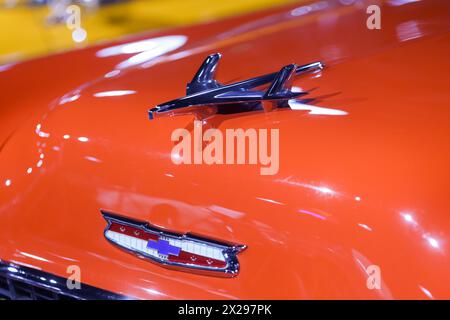 Bucharest, Romania - April 21, 2024: Details with the front part and emblem of a retro 1955 Chevrolet Bel Air Indy Pace Car convertible retro car. Stock Photo