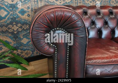 Fragment of an old leather sofa Stock Photo