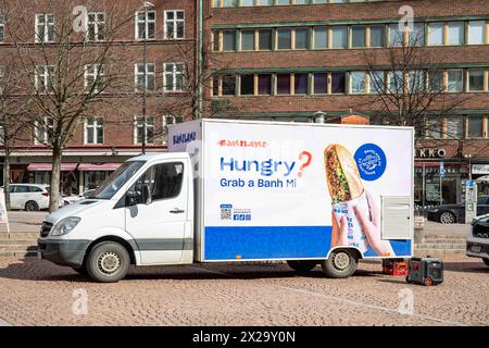 Hungry? Grab a Banh Mi. Vietnamese street food truck Bamilami parked at Kampintori square in Kamppi district of Helsinki, Finland. Stock Photo