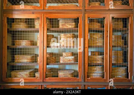 Showcase with wooden boxes for medicinal herbs in the ancient pharmacy (18th century) of the Trisulti Charterhouse, Collepardo, Lazio, Italy Stock Photo