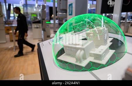 Hanover, Germany. 21st Apr, 2024. The symbolic model of an industrial plant protected against cyber attacks stands at the Phoenix Contact stand on the topic of cybersecurity at Hannover Messe 2024. The Hannover Messe industrial trade fair begins on April 22, 2024. Credit: Julian Stratenschulte/dpa/17�Թ����� Live News Stock Photo
