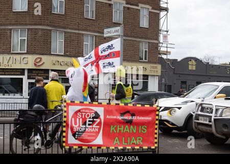 Hillingdon Circus, UK. 21st April, 2024. Anti ULEZ protesters were in Hillingdon Circus, West London today protesting against London Mayor Sadiq Khan's controversial Ultra Low Emission Zone (ULEZ). Motorists who still drive non compliant cars in the ULEZ areas have to pay a daily fee of £12.50. The London Mayoral Elections are to be held on 2nd May 2024 and Conservative Candidate, Susan, Hall says that she will scrap ULEZ if she is voted as London Mayor instead of Sadiq Khan on 2nd May. Credit: Maureen McLean/Alamy Live News Stock Photo