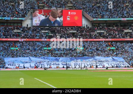 London, UK. 21st Apr, 2024. Coventry City fans in full voice as they unveil a banner ahead of kick off, during the Emirates FA Cup Semi-Final match Coventry City vs Manchester United at Wembley Stadium, London, United Kingdom, 21st April 2024 (Photo by Gareth Evans/News Images) in London, United Kingdom on 4/21/2024. (Photo by Gareth Evans/News Images/Sipa USA) Credit: Sipa USA/Alamy Live News Stock Photo