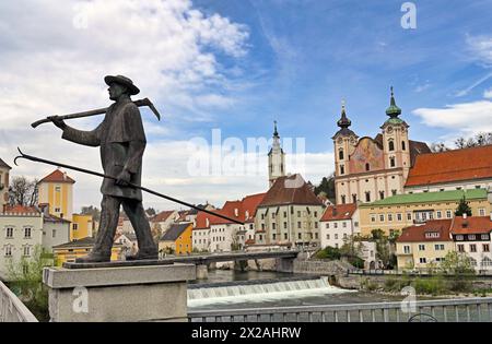 Monument on bridge in old town of Steyr, Austria Stock Photo