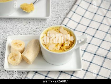 homemade Portioned Banana bread mugcake in small mugs. Stock Photo