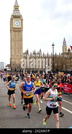 London, UK. 21st Apr, 2024. Participants run past Big Ben at 2024 London Marathon in London, Britain, April 21, 2024. Credit: Xinhua/Alamy Live News Stock Photo