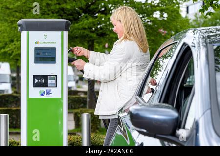 ScottishPower electric public charge points, Glasgow Science Centre electric vehicle charger EV Stock Photo