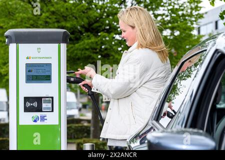 ScottishPower electric public charge points, Glasgow Science Centre electric vehicle charger EV Stock Photo