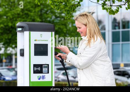 ScottishPower electric public charge points, Glasgow Science Centre electric vehicle charger EV Stock Photo