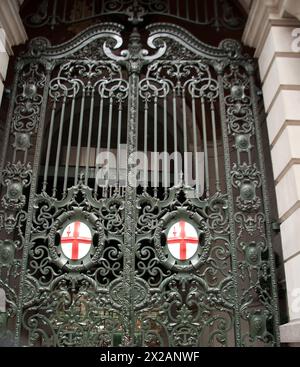 Gateway Entrance to the Royal Exchange, City of London, London, UK - ornate metal gateway.  The Royal Exchange in London was founded in the 16th centu Stock Photo