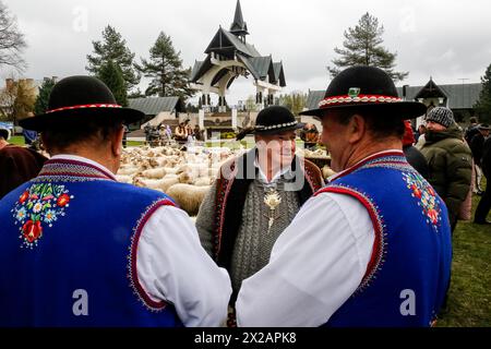 Ludzmierz, Poland April 21, 2024. Highlanders in ther traditional clothes attend Church rituals as grazing season begins with traditional folklore and religious celebrations, called locally Redyk, in Tatra mountains in Ludźmierz, Southern Poland. Redyk traditionally begins around 23 of April, a time when shepherds, locally called Baca, take flocks of sheep from villages uphill, away from civilization for the grazing season, which lasts about half a year. The beginning of the season is a festive time for the highlanders from Tatra and this part of Karpaty as sheep farming historically is a majo Stock Photo