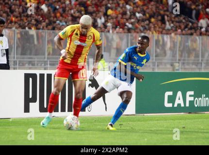 Rades, Tunis, Tunisia. 20th Apr, 2024. Yan Sasse of EST in action againts Thembinkosi Lorch during the 1/2 final match of CAF .EST vs Mamolodi Sundowns FC at the Rades stadium.Esperance Sportive de Tunis won a very important victory this evening against Mamelodi Sundowns in the semi-final first leg of the African Champions League.The only goal of this semi-final first leg was scored in the 41st minute by the Brazilian Yan Sasse, very well served by his compatriot Silva Rodrigo. (Credit Image: © Chokri Mahjoub/ZUMA Press Wire) EDITORIAL USAGE ONLY! Not for Commercial USAGE! Stock Photo