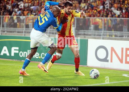 Rades, Tunis, Tunisia. 20th Apr, 2024. Amine Tougai (R) of EST in action againts Jonson Mudau during the 1/2 final match of CAF .EST vs Mamolodi Sundowns FC at the Rades stadium.Esperance Sportive de Tunis won a very important victory this evening against Mamelodi Sundowns in the semi-final first leg of the African Champions League.The only goal of this semi-final first leg was scored in the 41st minute by the Brazilian Yan Sasse, very well served by his compatriot Silva Rodrigo. (Credit Image: © Chokri Mahjoub/ZUMA Press Wire) EDITORIAL USAGE ONLY! Not for Commercial USAGE! Stock Photo