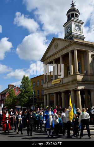 Chard, Somerset, UK. 21st Apr, 2024. Town cries leading the parade on Fore Street Sunday 21 st April 2024 Credit: Melvin Green / Alamy Live News Credit: MELVIN GREEN/Alamy Live News  Saint Georges Day Parade walking too Saint Marys Church for a Service. Stock Photo