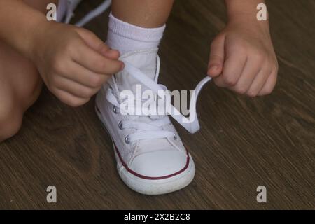 Illustration of Best Age To Transition From Trainer Shoes To Untied Laces