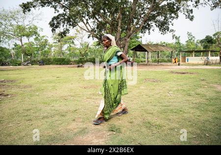 BOKAKHAT, INDIA, APRIL 19: Voters arrives at a polling station to cast their votes during the first phase of the India's general elections on April 19 Stock Photo