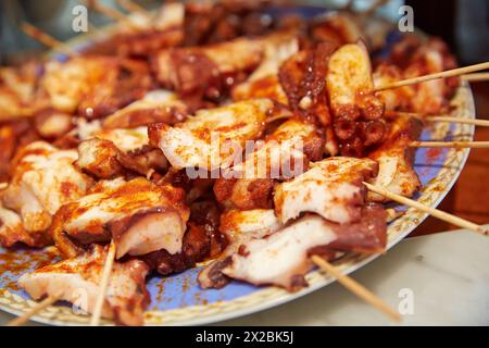 Octopus skewer, ´pintxos´ at Bar Txondorra in ol town, Donostia (San Sebastian), Gipuzkoa, Basque Country, Spain Stock Photo